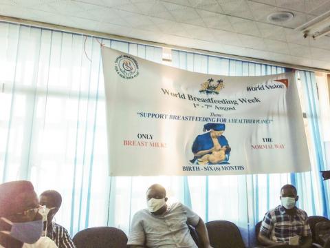 A banner of World Breastfeeding Week hangs at the Ministry of Health Conference Health