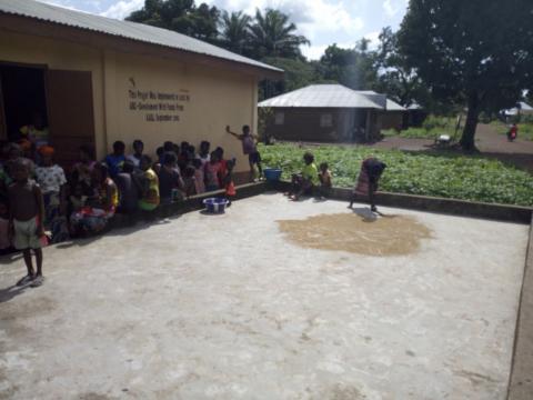 A seed bank and drying floor at Samu village