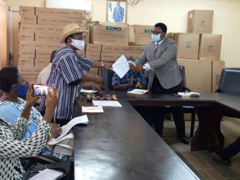 Abu Brima presenting their inputs to the Mines Minister