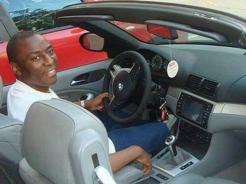 David Junusa inside his BMW 320 convertible 