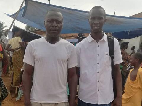 Kelfala Bangalie one of the beneficiaries and  Ibrahim Kondeh Chairman for the Descendants of Kindia Town Association