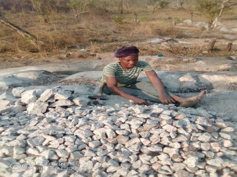 Manteneh Kargbo breaking stones at the Serekoliya Road Quarry.jpg