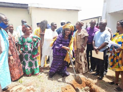 Minister Pratt turning sod for the construction project.