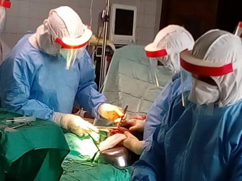The medics carrying out the surgery The medics carrying out the surgery