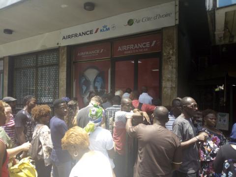 Passengers outside Air France's office