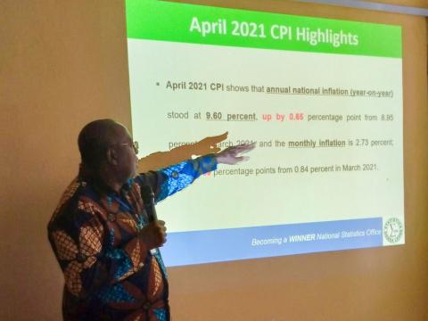 Professor Sankoh presenting the Monthly inflation data