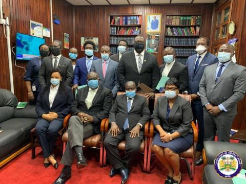 The 12 appointed Notries pose with Chief Justice